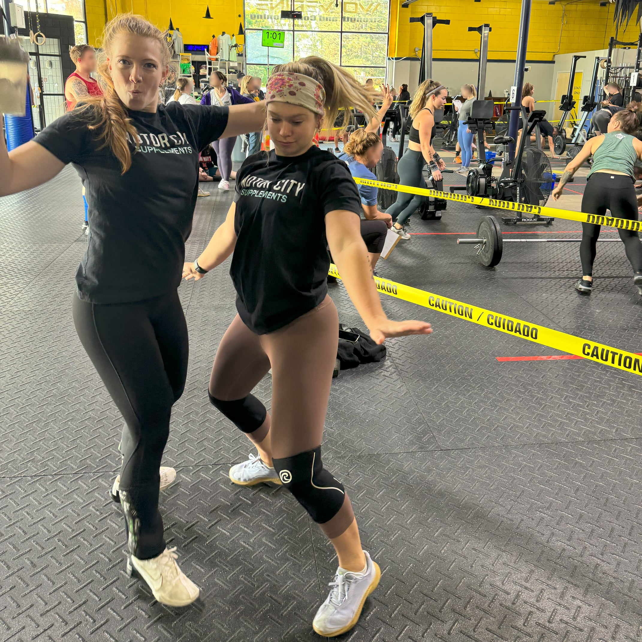 Two women dancing at a competition. 