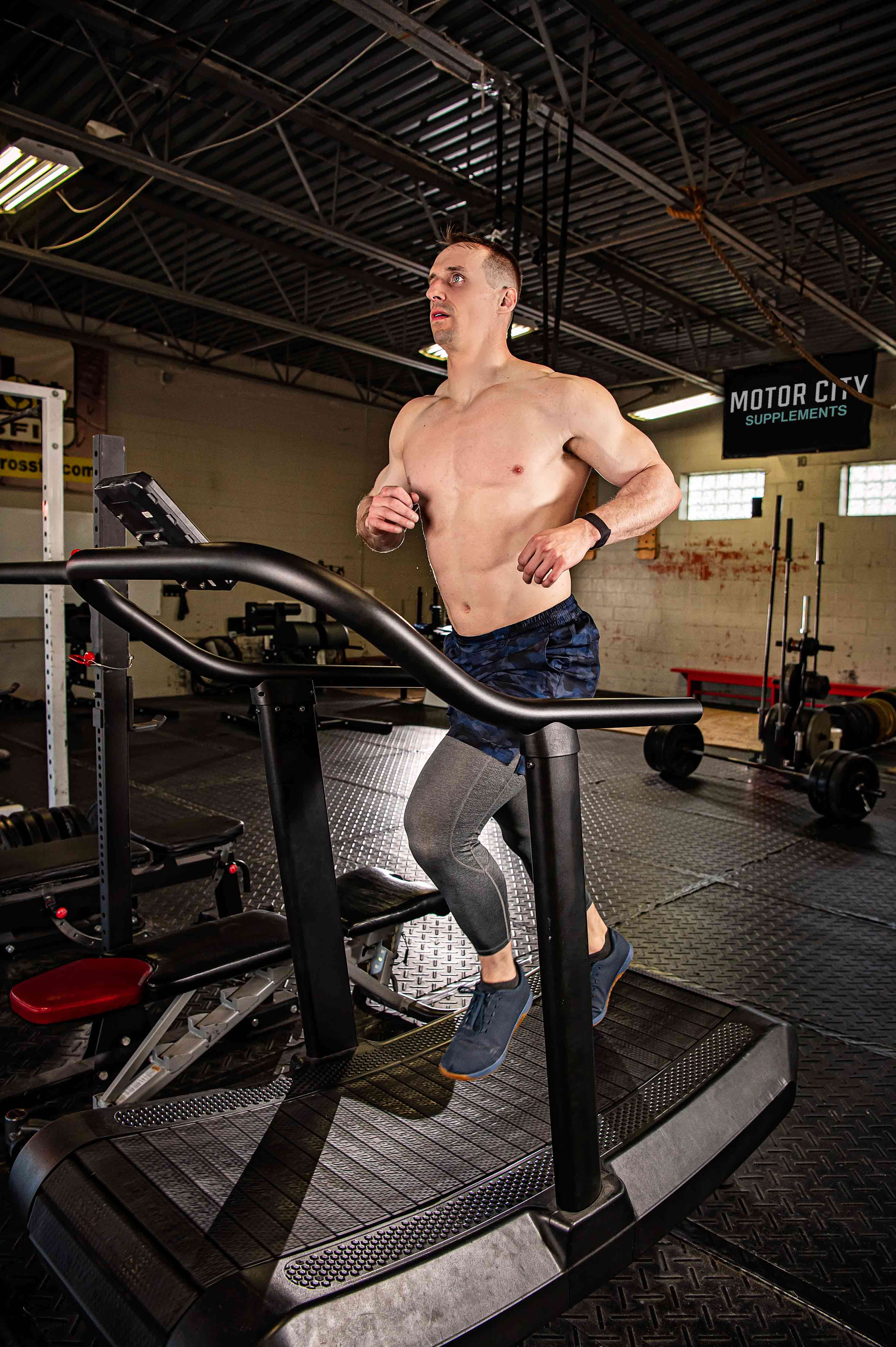 Andrew Smallman running on treadmill.